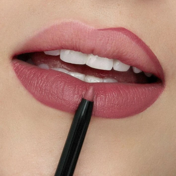 Customer using contour lip liner