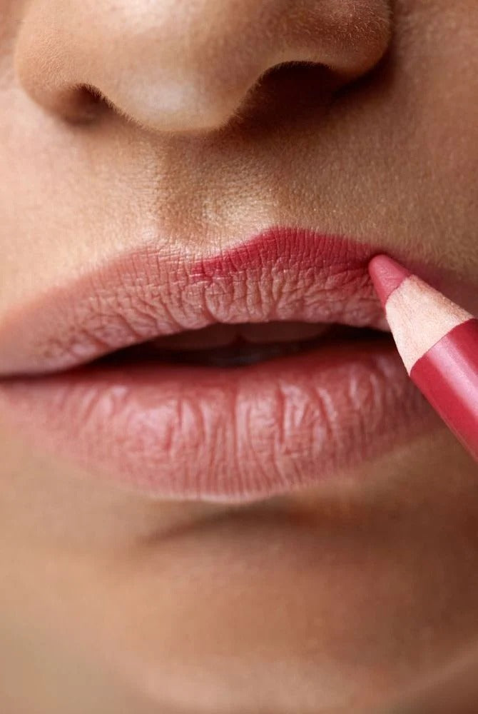 Customer using lip liner